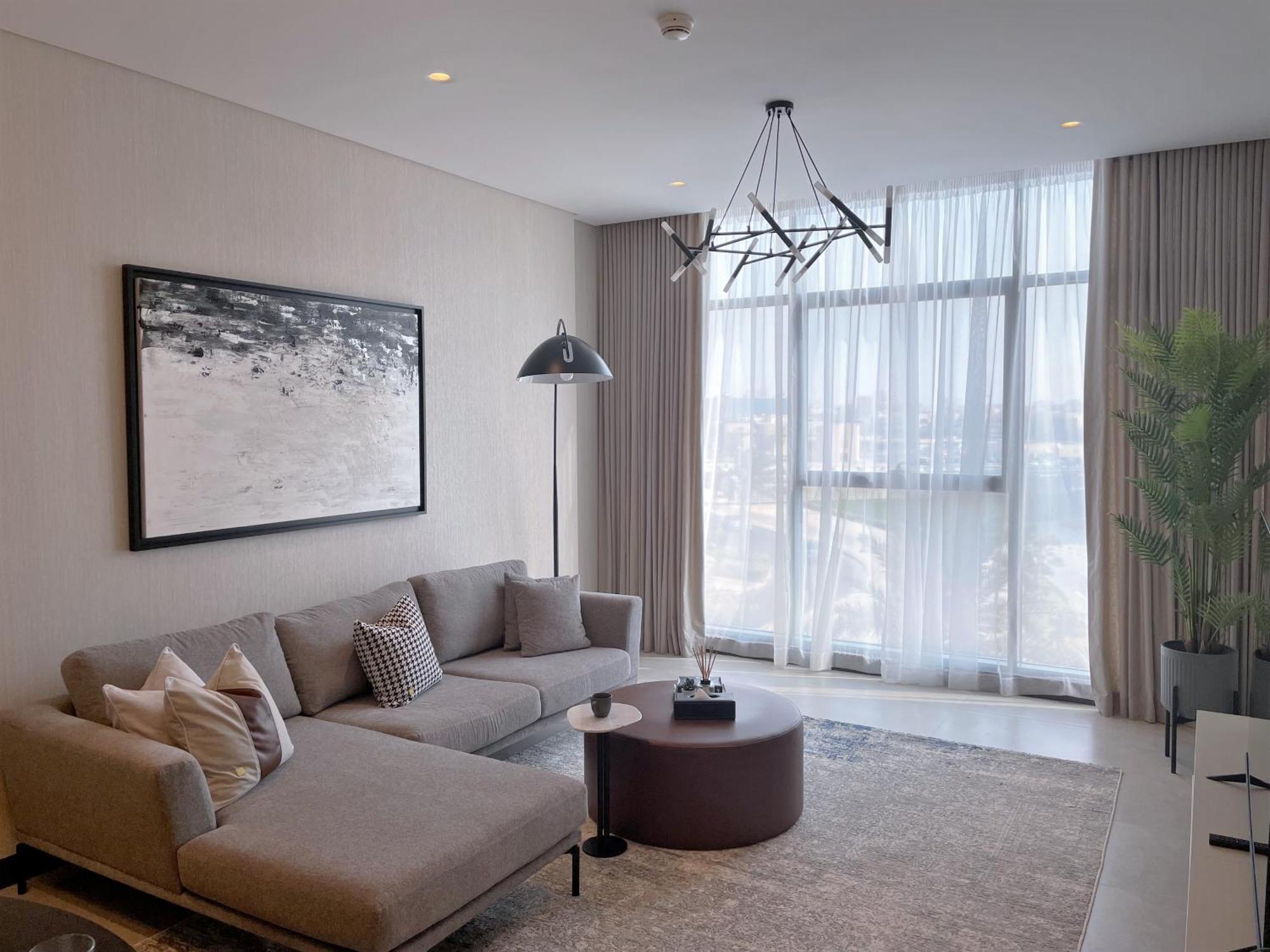 Charthouse Bahrain Hotel Manama Exterior foto A living room in a typical apartment